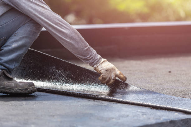 Professional Waterproofing technician working in Saint Paul, IN